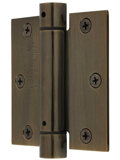 3 1/2 inch Single Action Spring Hinge with Square Corners in Antique Brass.